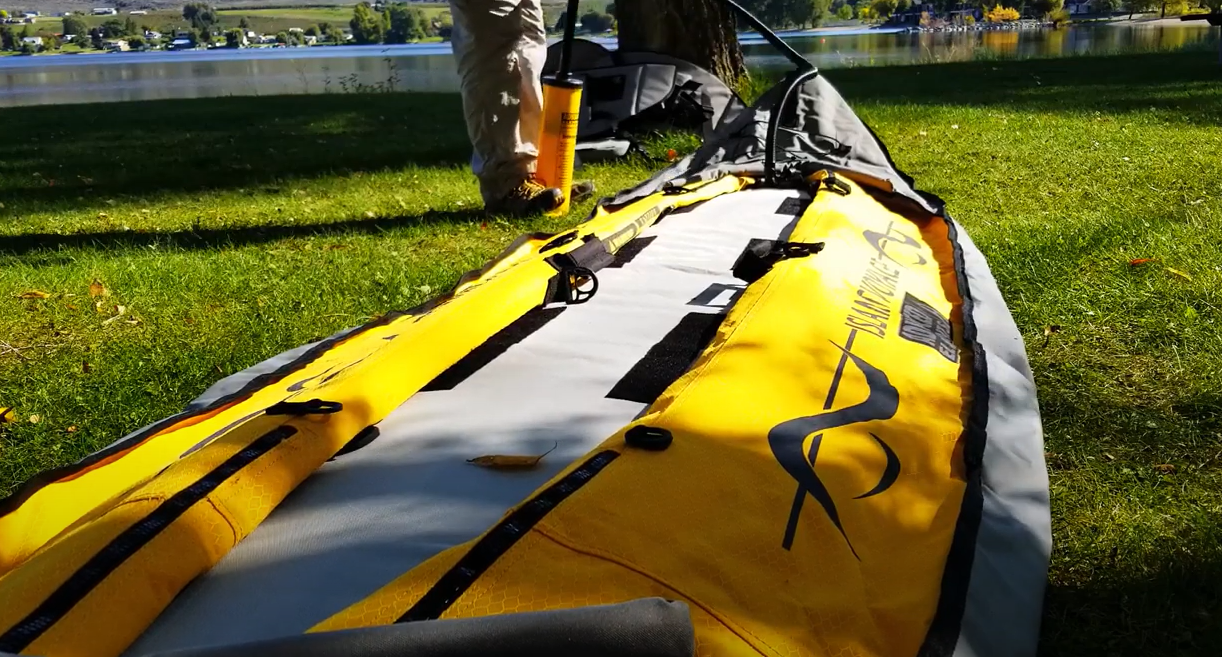 pumping inflatable kayak